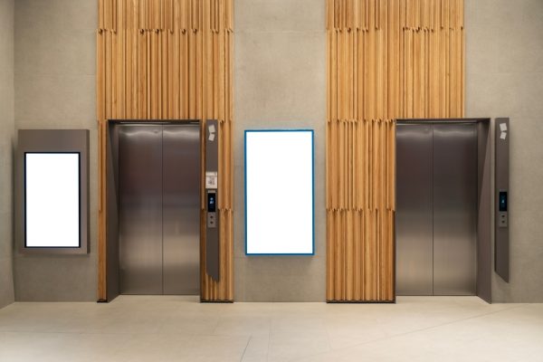 Contemporary,Elevator,Lobby,Featuring,Two,Modern,Elevators,With,Polished,Metal